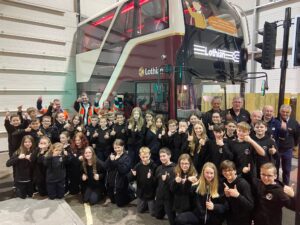 School children beside the Risk Bus in the Risk Factory.