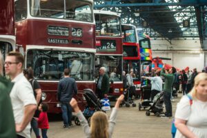Lothian Buses' Doors Open Day in 2019, showing visitors looking at buses lined up.
