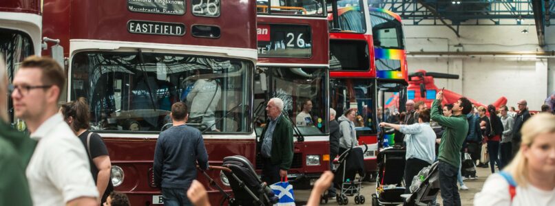 Lothian Buses' Doors Open Day in 2019, showing visitors looking at buses lined up.