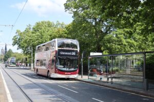 A Lothian bus at a bus stop on Princes Street.